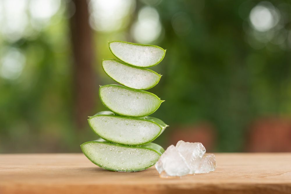aloe-vera-product-display-wood-counter-background-aloe-vera-is-tropical-green-plants-sliced-aloe-vera-natural-organic-renewal-cosmetics-alternative-medicine-organic-skin-care-concept (1)